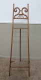 Ornate wood and brass floor standing easel, 66