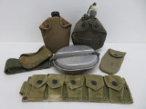 Military lot with canteens, ammo belts and canteen