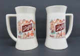 Two large Schlitz mug banks, 7 3/4