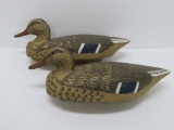 Two wooden and resin decoys, 15