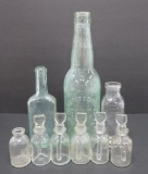 Assorted vintage bottles and stoppers