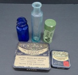Vintage medicine bottles and tins