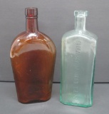 Two vintage Bitters Bottles, Quaker and Yerba Bueno, amber and aqua, 9