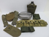 Military lot with canteen, mess kit, and ammo belts