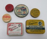 Six ointment and remedy tins