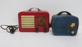 Two vintage radios, red General Television and blue metal Kent