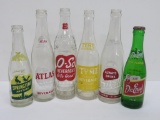 Six colored label soda water bottles, pyro, 7 0z and 10 oz