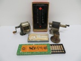 Vintage office supplies, pencil sharpeners, bell and address book