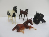 3 Breyer Horses with mini toy saddle