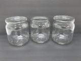 Three vintage storage jars, two with covers, 6' tall