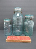 Three blue canning jars, Lightning, and zubian sealing wax