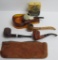 Four pipes, glass pipe tray, tobacco and leather pouch