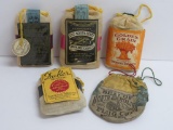 Four cloth tobacco pouches unopened and one North Carolina Plug cut cloth bag empty