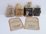 Four full cloth tobacco pouches and two pocket cloth chew pouches