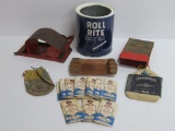 Cigarette roller machines, Roll Rite tin, cigarette papers and two tobacco pouches and ashtray