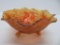 Stag and holly carnival glass footed bowl, marigold, 9