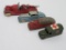 Four vintage toy vehicles, fire truck, ambulance, trailer and car