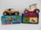 Two battery operated bump and go cars in boxes, need work, as found