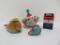 Four vintage toys, Dolly the Dolphin friction, tin top, tin mouse and metal mailbox bank