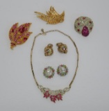 Miriam Haskell and Weiss earrings, pins and Bogoff necklace