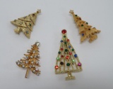 Four Christmas tree pins, 1 1/2