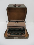 Vintage Remington Quiet Riter typewriter and case