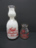 Luick cream top milk bottle, quart and Missouri Pacific railroad Sunnymede half pint