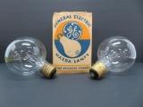 Two large vintage light bulbs