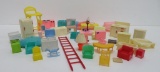 About 41 pieces of vintage plastic dollhouse furniture