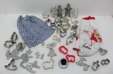 36 vintage cookie cutters and two vintage aprons