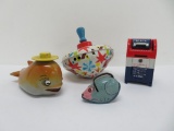 Four vintage toys, Dolly the Dolphin friction, tin top, tin mouse and metal mailbox bank