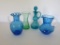 Four pieces of hand blown colored glass, pitchers and cruet, 4