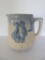 Embossed blue and white stoneware pitcher, 7