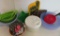 Assorted Plasticware lot, salad spinner, colanders and strainers, pot holders