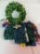 Funky brightly colored Christmas decorations, wreath, lights and garland