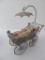 Metal parasol doll buggy with two 2