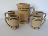 Buckeye stoneware blue banded pitcher and four mugs