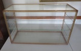 Table top display case, glass with metal trim,open back