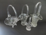 Four vintage glass baskets