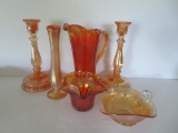 Six pieces of marigold carnival glass