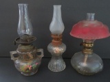 Three miniature oil lamps, 7