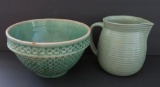 Green stoneware mixing bowl and Western milk pitcher