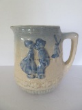 Embossed blue and white stoneware pitcher, 7