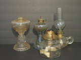 Four vintage glass oil lamps, 3