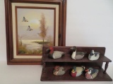 Oil painting of Ducks and 1984 Avon duck collection with display shelf