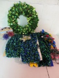Funky brightly colored Christmas decorations, wreath, lights and garland