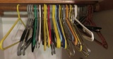 Assorted plastic and metal hangers