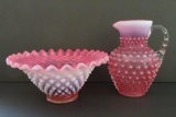Cranberry glass hobnail bowl and cream pitcher