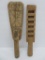 Two ornate wooden paddles, one dated 1936, 14 1/2