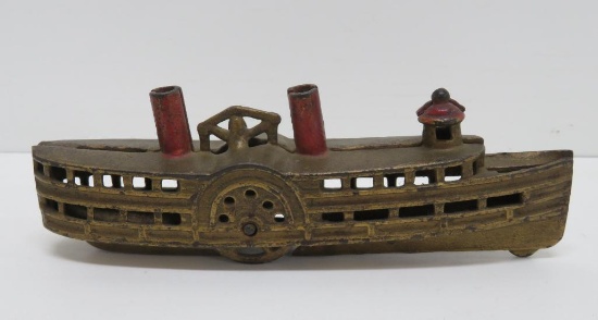 Cast iron paddle wheel boat still bank, 8"